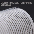 Close-up of a brush with ultra fine self-gripping bristles on a black background.