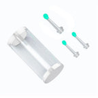 Clear cylindrical container with two silver ear studs and green ends on a white background