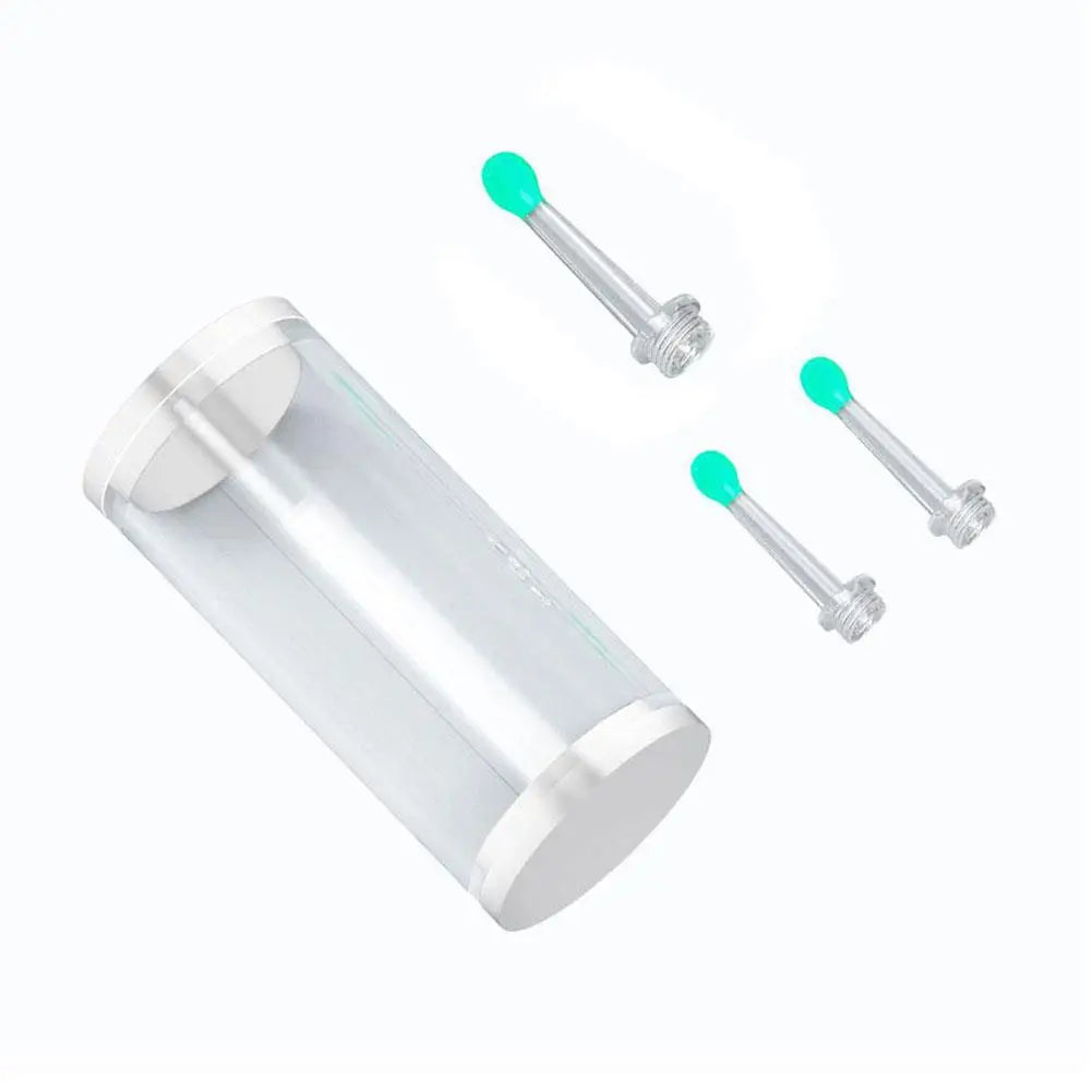 Clear cylindrical container with two silver ear studs and green ends on a white background