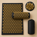Black and gold acupressure mat set with a matching cylindrical pillow, shown alongside its black drawstring storage pouch on a beige background. A circular inset at the top right shows a close-up of the gold acupressure rose texture.