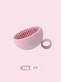 Pink Silicone Makeup brush cleaner on a light pink background